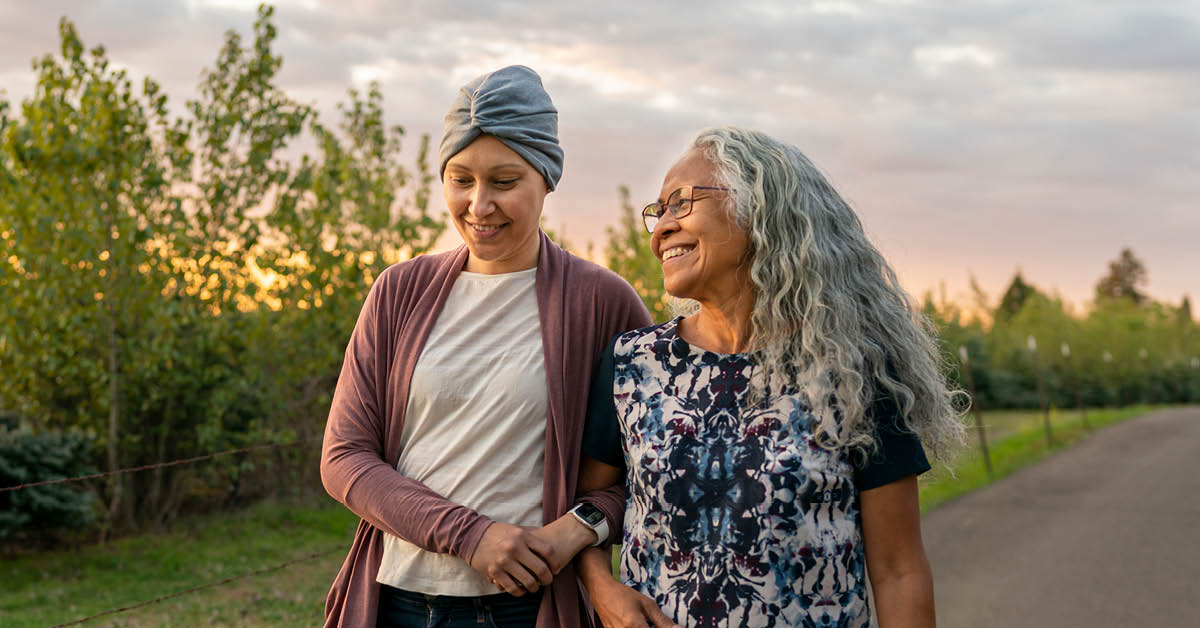cancer patient with friend on a walk
